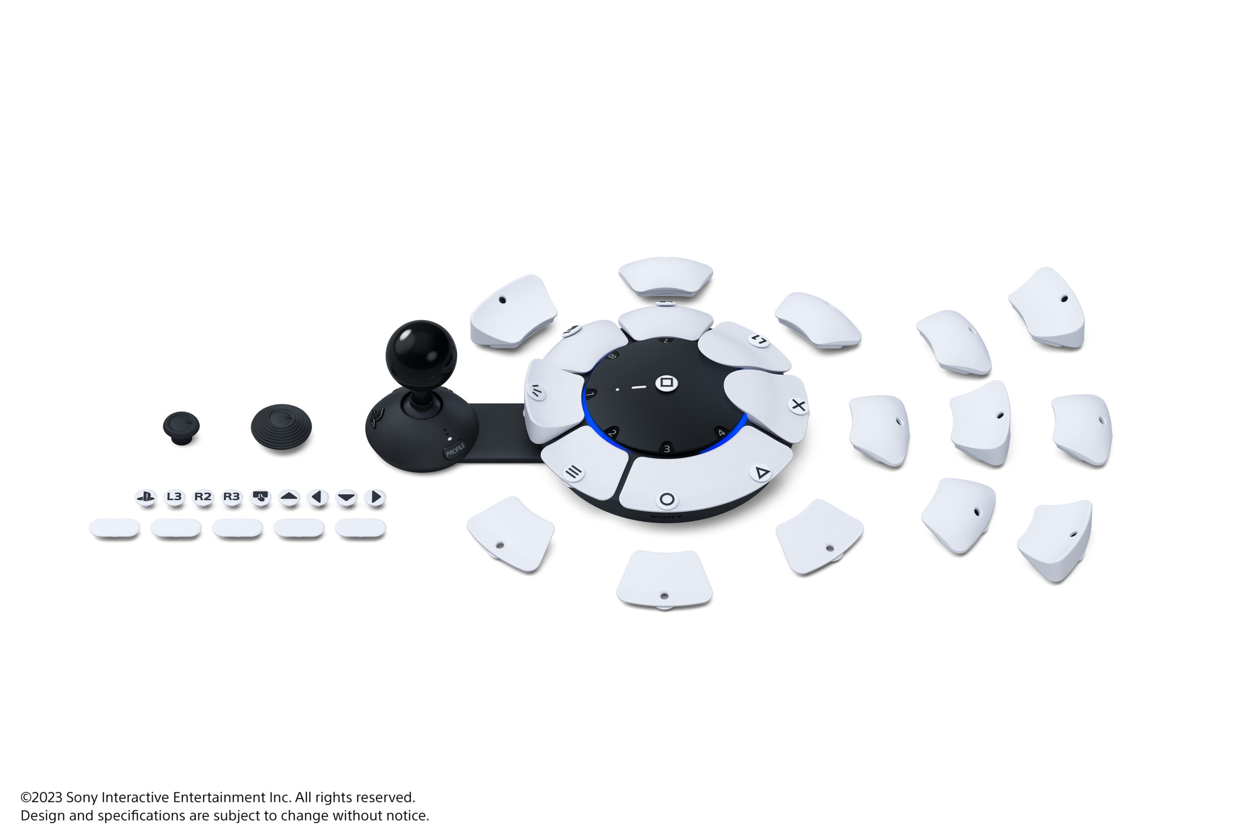  "Image showing the Access controller and its swappable analog stick caps, button caps and button cap tags"