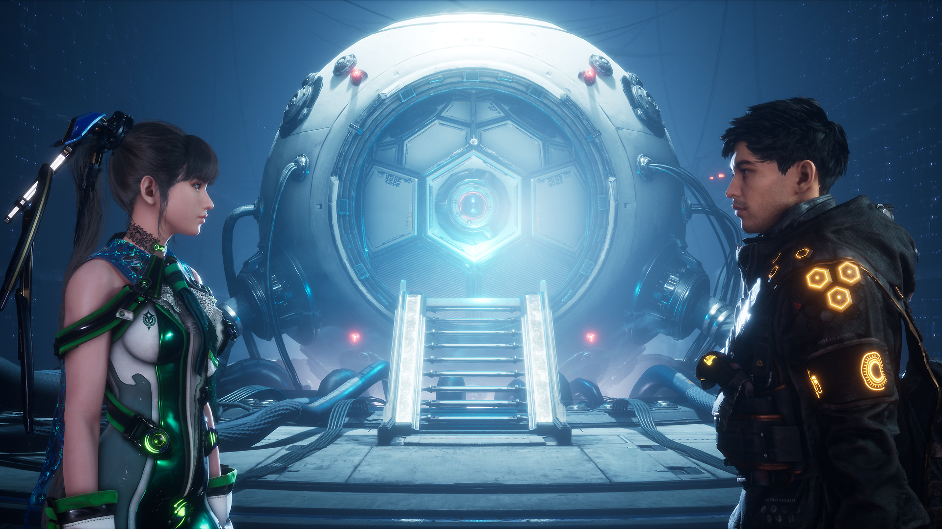  "Eve and Adam face each other in the foreground. Behind them is a short stairwell that leads up to a large circular contraption. Multiple leads and wires are plugged into it. "